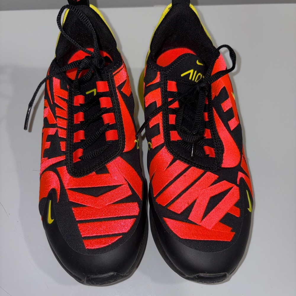 Nike Red and Black Sneakers with Yellow Accents